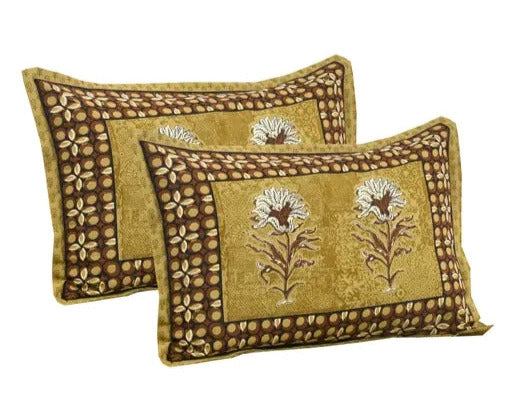 Two decorative pillows with floral patterns on a white background