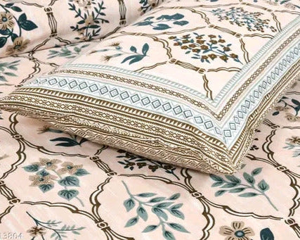 Floral patterned bedsheet with matching pillowcase on a floral background