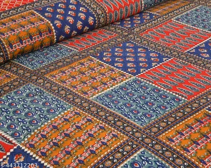 Patterned fabric with geometric design in red, blue, and orange on a checkered background