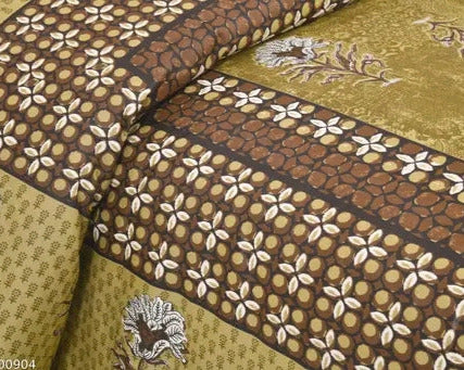 Close-up of patterned fabric with floral designs on a green and brown background
